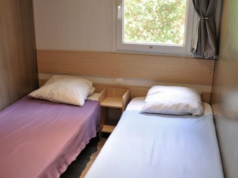Mobilhome 4 personnes - Maldives CONFORT -2 chambres 32m²- *Clim, terrasse, TV*