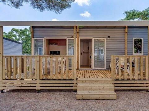 MOBILHOME 4 personnes - Mobil-home | Comfort | 2 Ch. | 4 Pers. | Terrasse surélevée | Clim. MOBILHOME 4 personnes - Mobil-home | Comfort | 2 Ch. | 4 Pers. | Terrasse surélevée | Clim.