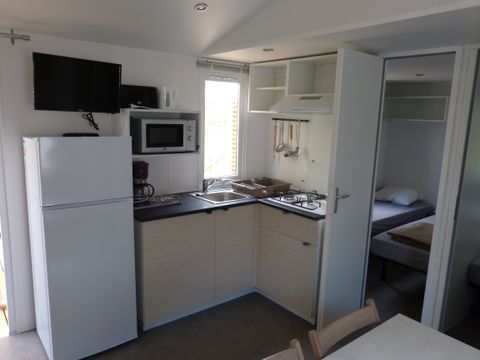 Mobilhome 8 personnes - Climatisé de 28.3m² - 3 chambres - Terrasse semi couverte 22.5m²