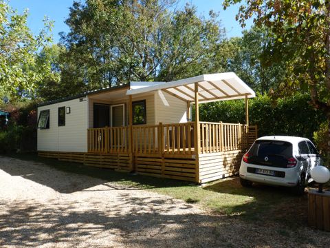Mobilhome 4 personnes - 26m² climatisé - 2 chambres - Terrasse couverte 20m²