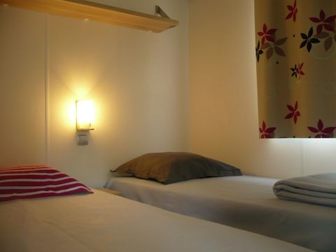 Mobilhome 4 personnes - 20m² - 2 chambres - Terrasse semi couverte 7,50m²