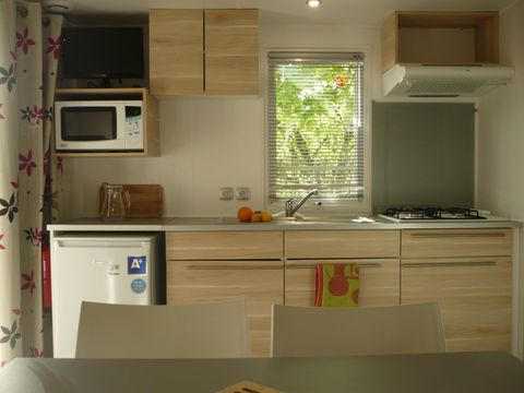 Mobilhome 4 personnes - 20m² - 2 chambres - Terrasse semi couverte 7,50m²
