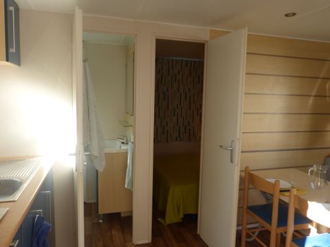 Mobilhome 2 personnes - 16m² - 1 chambre - Terrasse couverte 10m²
