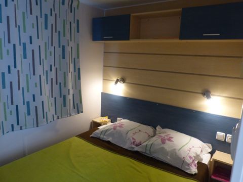 Mobilhome 2 personnes - 16m² - 1 chambre - Terrasse couverte 10m²