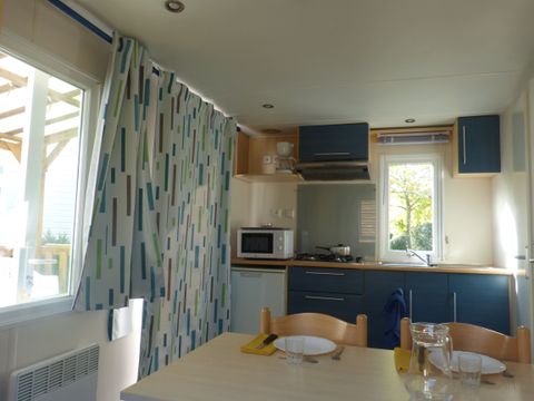 Mobilhome 2 personnes - 16m² - 1 chambre - Terrasse couverte 10m²