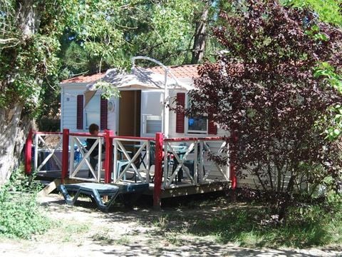 MOBILHOME 4 personnes - Mobil-home Standard Escapade 23m² - 2 chambres + Terrasse avec parasol - 4 pers