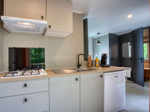 MOBILHOME 10 personnes - Tribu 2x26m² - 4 chambres - terrasse semi-couverte 22m² - TV - lave vaisselle