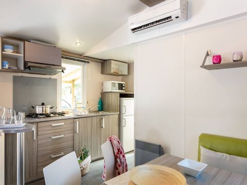 Mobilhome 4 personnes - Mobil-home | Comfort | 2 Ch. | 4 Pers. | Terrasse surélevée | 1 SDB | Clim.