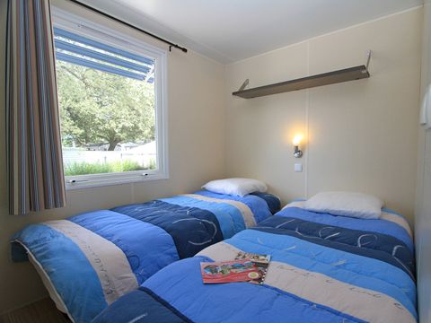 MOBILHOME 4 personnes - 'Evasion Confort Eco' 29m² + 2 chambres + terrasse semi-couverte 13.5m²
