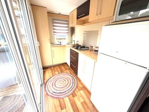 MOBILHOME 4 personnes - Riviera - 2 chambres + terrasse semi-couverte