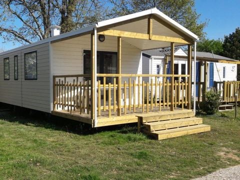 MOBILHOME 4 personnes - Mobil-home Confort 23m² - 2 chambres + Terrasse semi-couverte 9m² 4 pers