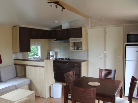MOBILHOME 4 personnes - Mobil-home Confort 23m² - 2 chambres + Terrasse semi-couverte 9m² 4 pers