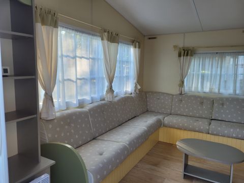 MOBILHOME 4 personnes - Confort Supérieur 4p (32m²) avec terrasse couverte, 2 chambres, climatisé