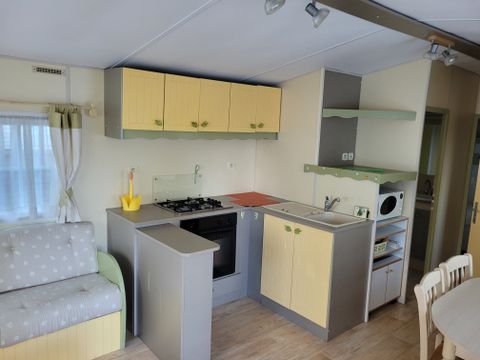 MOBILHOME 4 personnes - Confort Supérieur 4p (32m²) avec terrasse couverte, 2 chambres, climatisé