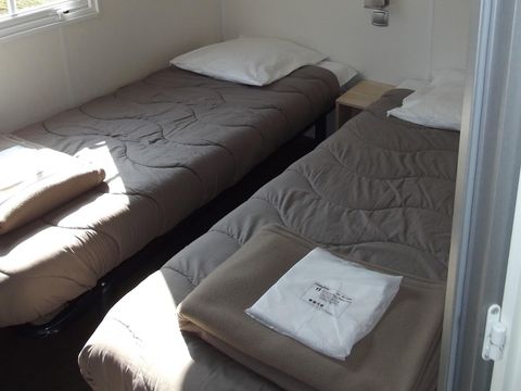 MOBILHOME 4 personnes - Confort 4p (27m²) avec terrasse couverte, 2 chambres, climatisé