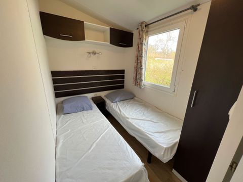 MOBILHOME 4 personnes - Mobil home Watipi ECO 26 m² (2 chambres)+terrasse couverte de 7 m² 1/4 pers