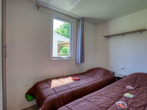 MOBILHOME 4 personnes - Mobil-Home Confort 25m² Loggia - 2 chambres + Terrasse couverte 4 pers