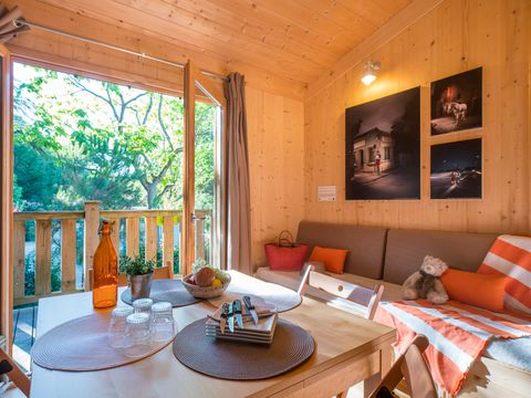 Hébergement 3 personnes - La Cabane du Voyage - Cabane sur pilotis 1 chambre - 24m² + terrasse 16m²