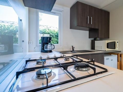 MOBILHOME 2 personnes - Mobil-home Plage 18.6m² (+ de 10 ans) (1 chambre) + Terrasse bois semi-couverte + TV 2 pers