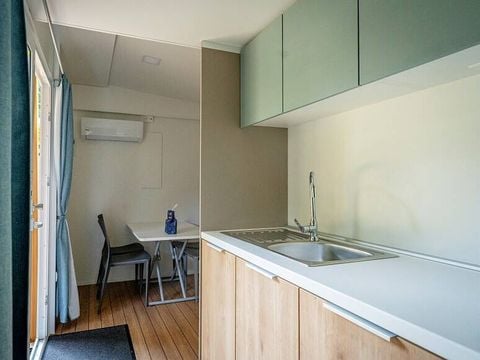 MOBILHOME 6 personnes - Mobil-home | Comfort | 3 Ch. | 6 Pers. | Terrasse surélevée | Clim. MOBILHOME 6 personnes - Mobil-home | Comfort | 3 Ch. | 6 Pers. | Terrasse surélevée | Clim.