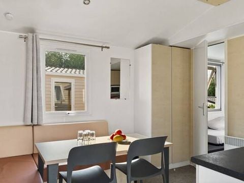 MOBILHOME 4 personnes - Comfort | 2 Chambres | Capacité 4 personnes | Terrasse semi couverte | 1 Salle de bain | Climatisation