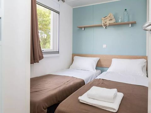 Mobilhome 6 personnes - Standard 32m² - 3 chambres - Terrasse intégrée