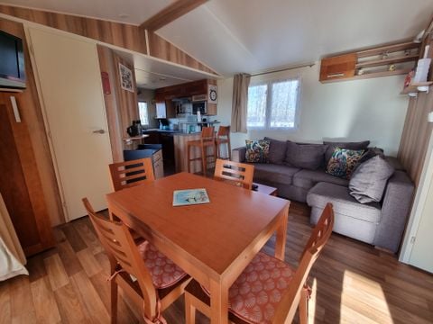 MOBILHOME 4 personnes - 36 Résidence les genêts 32M2, Terrasse Couverte, Télevision + Lave Vaisselle 1/4 pers
