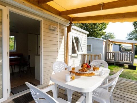 MOBILHOME 4 personnes - 2 chambres (sans sanitaires) 1 couple et 2 enfants de - 40 kgs