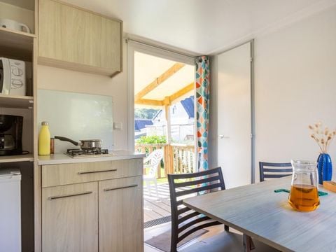 MOBILHOME 4 personnes - 2 chambres (sans sanitaires) 1 couple et 2 enfants de - 40 kgs