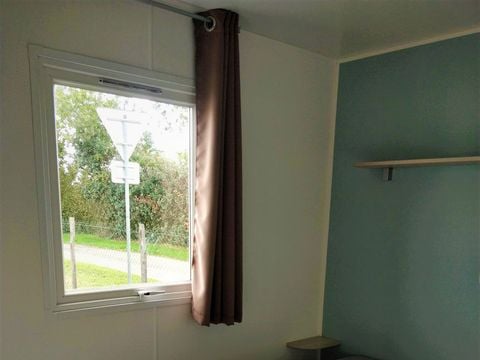 MOBILHOME 4 personnes - 2 chambres (sans sanitaires) 1 couple et 2 enfants de - 40 kgs