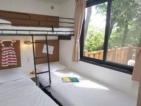 MOBILHOME 6 personnes - Comfort | 2 Chambres | Capacité 4-6 personnes | Terrasse semi couverte | 1 Salle de bain | Climatisation