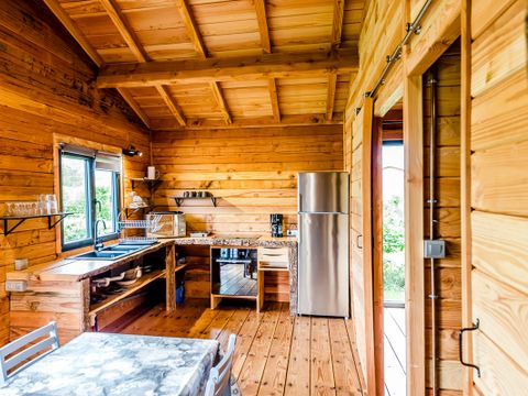 Chalet 6 personnes - Confort 50m² - 3 chambres + terrasse couverte + TV + four
