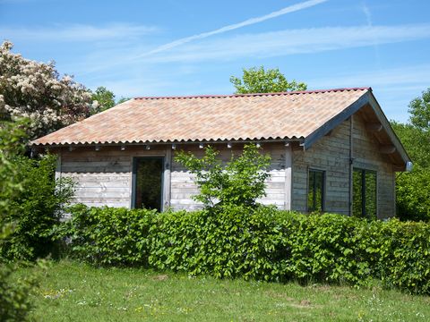 Chalet 6 personnes - Confort 50m² - 3 chambres + terrasse couverte + TV + four