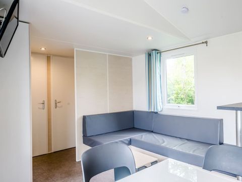 Mobilhome 8 personnes - Familial Confort 40m² Vue Lac - 4 chambres - Terrasse couverte - TV