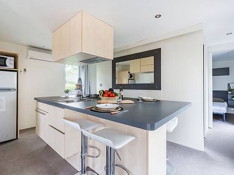 Mobilhome 8 personnes - Premium Exclusive | 3 Ch. | 6/8 Pers. | Terrasse surélevée | 2 SDB | Clim. | TV