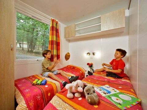 Mobilhome 8 personnes - Premium Exclusive | 3 Ch. | 6/8 Pers. | Terrasse surélevée | 2 SDB | Clim. | TV