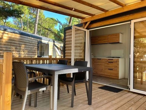 MOBILHOME 4 personnes - BAHIA BOIS 29m²  - 2 chambres avec une terrasse bois couverte et une terrasse solarium