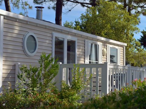 Mobilhome 4 personnes - COTTAGE CONFORT 2 chambres - 30m2 - terrasse parasol 4 pers