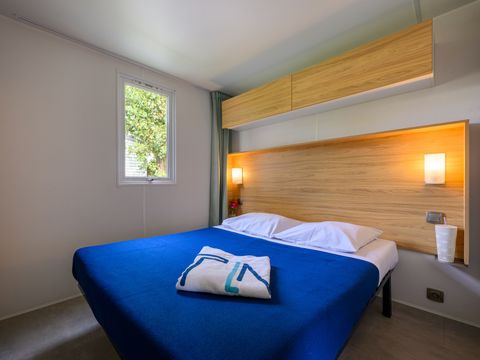 Mobilhome 4 personnes - COTTAGE CONFORT 2 chambres - 30m2 - terrasse parasol 4 pers