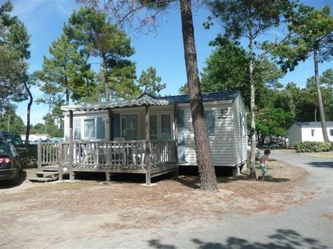 Mobilhome 1/4 personnes - Classique - 2 chambres - Avec terrasse