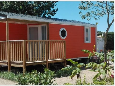 Mobilhome 4 personnes - GOYAVE -25 m² - 2 chambres- terrasse intégrée