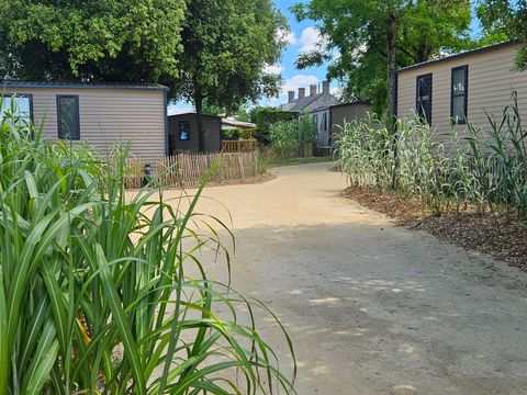 Mobilhome 4 personnes - PREMIUM "TERRE et DUNE" - 32m² - terrasse couverte 19 M²- 2 chambres - Nouveauté 2024