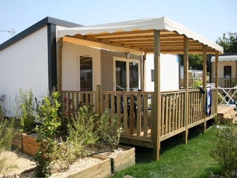 MOBILHOME 5 personnes - Mobil-home Premium + 40m² (2ch - 5pers) + TV + LV + BBQ + Clim + 2 SDB