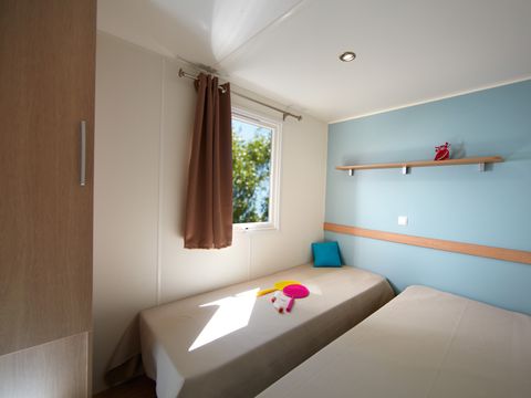 Mobilhome 4 personnes - Grand Confort TV Clim - 2 chambres - 4 personnes