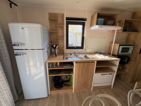 Mobilhome 4 personnes - Palmy Premium 24,5m2 - 2 chambres - CLIM - TV - Lave-vaisselle - Terrasse Couverte