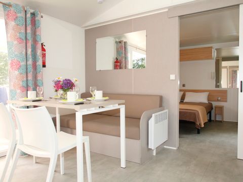 MOBILHOME 4 personnes - Confort 29m² - 2 chambres - Terrasse couverte - TV
