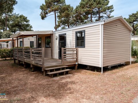 Mobilhome 4 personnes - Premium 32m² - 2 chambres - 2 salles de bain - Lave Vaisselle - Terrasse semi-couverte 15m²