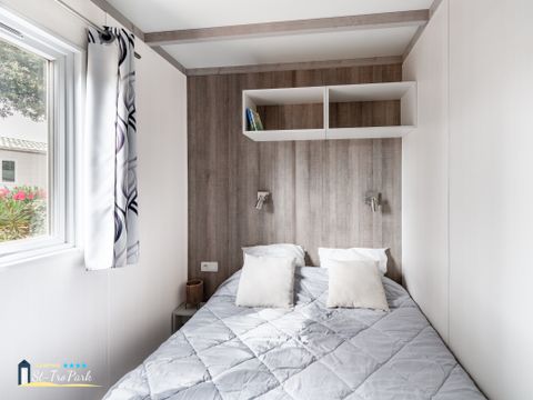 Chalet 4 personnes - Confort 26.5m² - 2 chambres - Terrasse couverte - TV