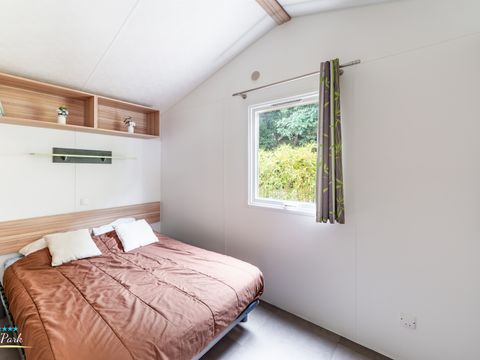 Mobilhome 4 personnes - Confort 27.5m² - 2 chambres - Terrasse bois semi-couverte 11m²