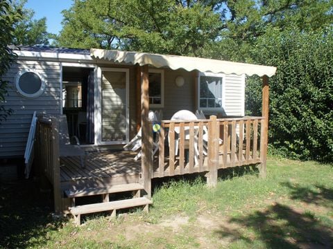MOBILHOME 7 personnes - Mobil home Premium 32 m² 3 chambres + terrasse 12m² semi-couverte (9m²) + TV + clim 6/7 pers